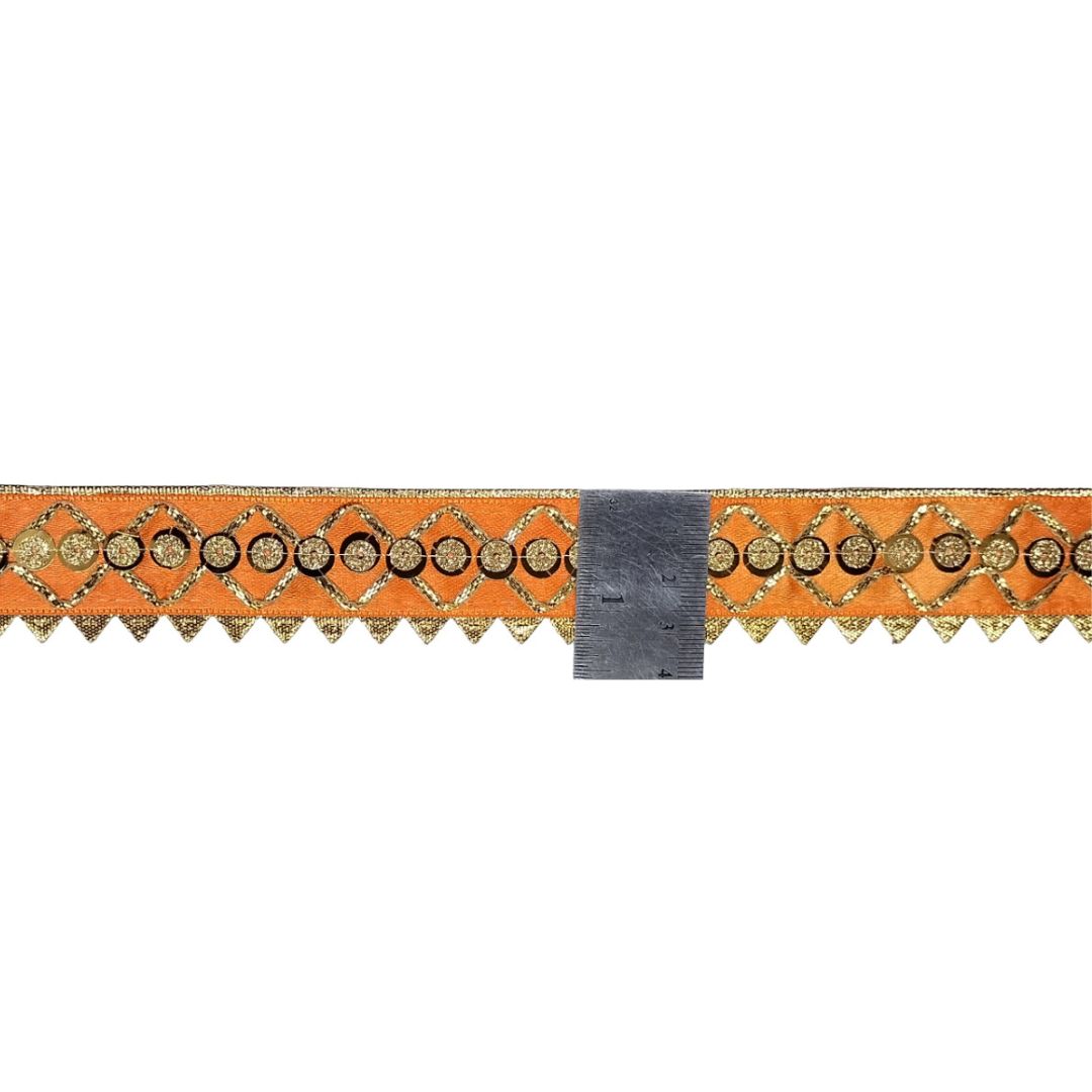 Decorative border trim with orange and gold pattern on a white background